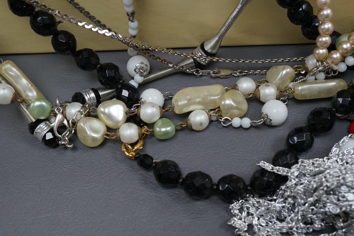 A quantity of assorted costume including necklaces, bangle, etc. and two wrist watches.